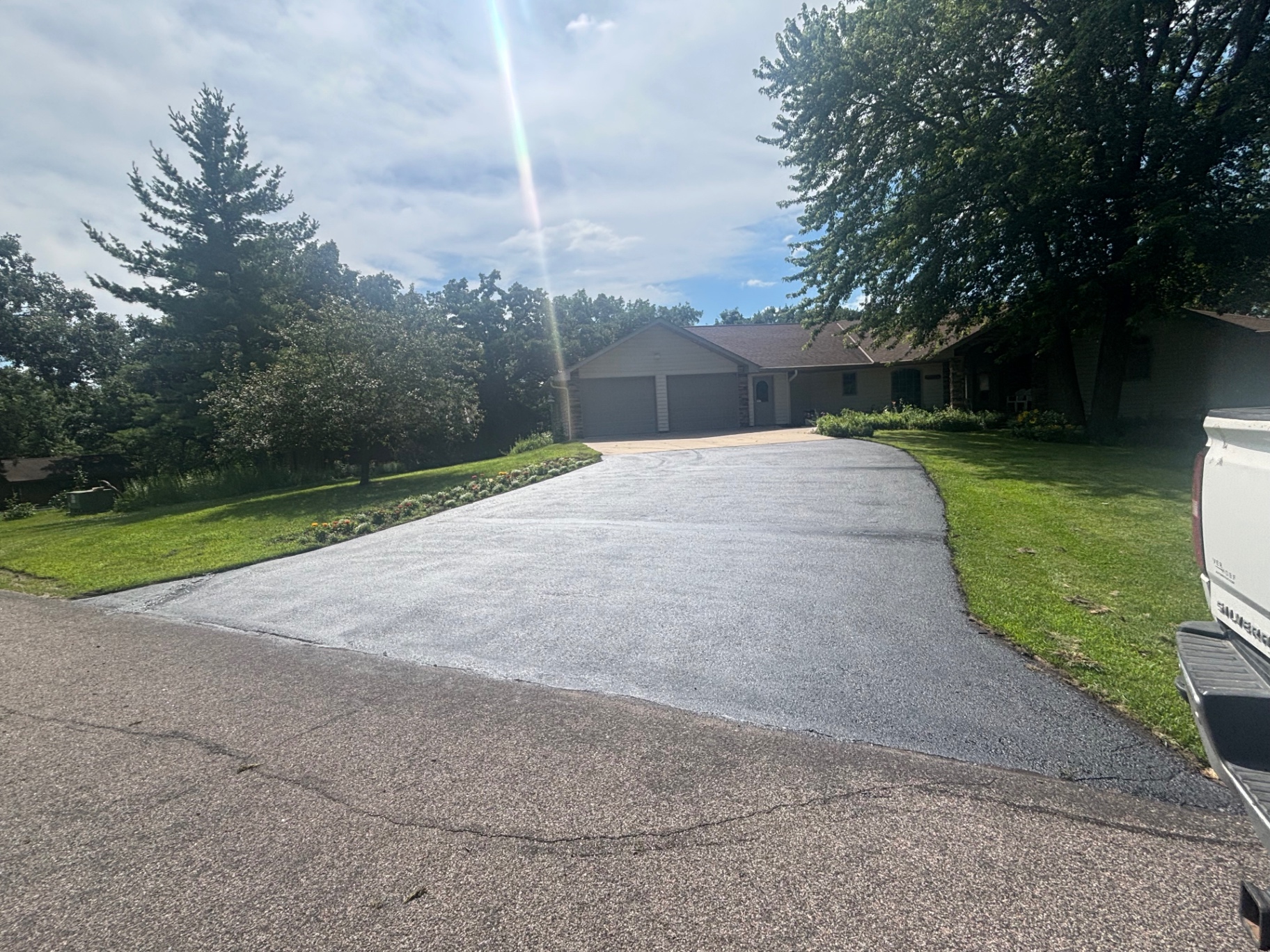 Deep rich black freshly sealed driveway after GSP 78 application